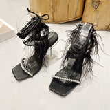 Eilyken New Design Womens Sandals Fashion Fuzzy Feather Summer Transparent High Heels Sexy Nightclub Stripper Shoes Purple Green